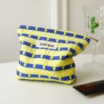 Elegante trousse motifs paon