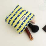 Accessoire beauté motifs plumes