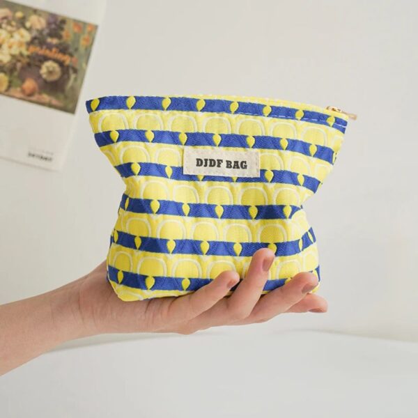 Petite trousse de maquillage plumes de paon